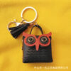 oly-40c0f3ff0848196255b0e71fd13866d8 Wholesale New Pu Leather Owl Coin Purse Cute Cartoon Bluetooth Headset Bag Fashion Tassel Car Key Pendant