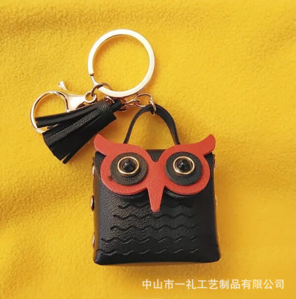 oly-40c0f3ff0848196255b0e71fd13866d8 Wholesale New Pu Leather Owl Coin Purse Cute Cartoon Bluetooth Headset Bag Fashion Tassel Car Key Pendant