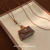 oly-411ff2da142745abc97d415ec25eae87 Wholesale Vintage Cute Leather Coin Purse Neck Necklace 2024 New Autumn and Winter Design Sense Niche Long Woolen Chain