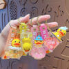 Wholesale Cartoon oil-filled yellow duck keychain creative duck car bag doll key chain pendant small gift