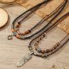 Wholesale retro butterfly alloy multi-layer wooden beads knotted hand-woven necklace jewelry