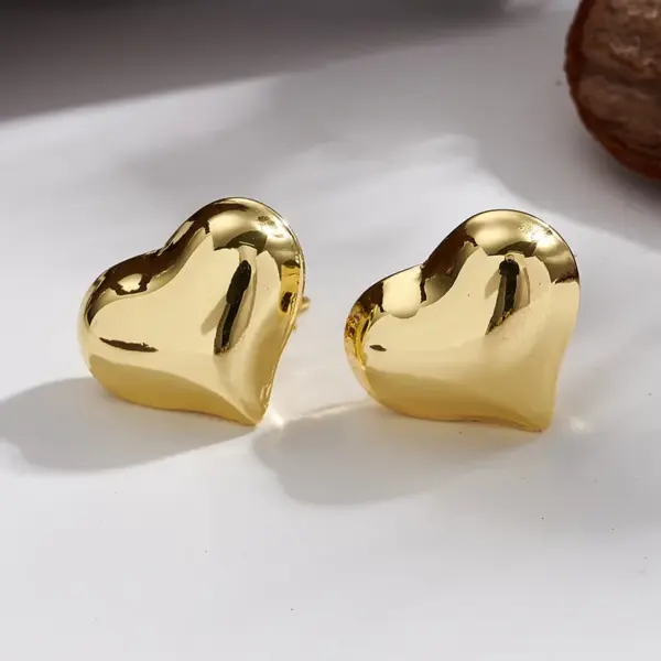 Wholesale PVD Coated 18K Gold Plated Heart Shape Bow Knot 201 Stainless Steel Casual Basic Exaggerated Polishing Plating Earrings Ear Studs