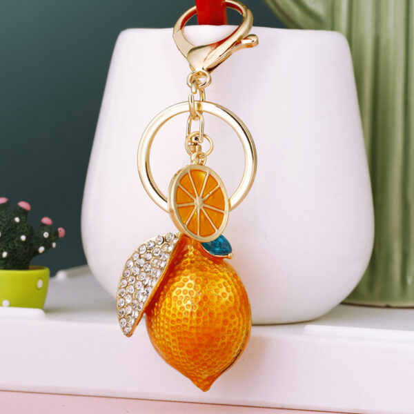 Wholesale New creative alloy rhinestone simulation fruit lemon car key chain bag pendant couple key chain gift