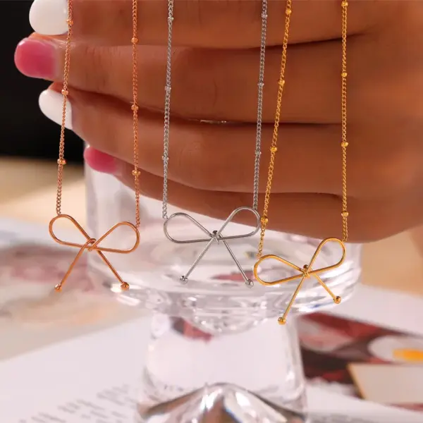 Wholesale PVD Coated Real Gold Plated 18K Gold Bow Knot 304 Stainless Steel Casual Simple Style Commute Waterproof Non Tarnish Bracelets Necklace