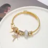 Wholesale Simple Style Letter Coconut Tree Stainless Steel Alloy Resin Inlay Artificial Gemstones Bangle