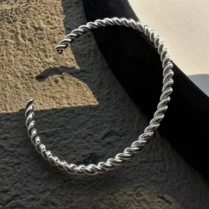 32B-E-9 Steel Color Twist Open Bracelet