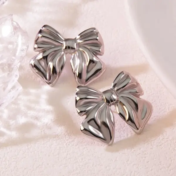 oly-450506276de33b8d207a7d61688aa1bb Wholesale 1 Pair Casual Simple Style Classic Style Bow Knot 304 Stainless Steel Imitation Gold Electroplating Ear Studs