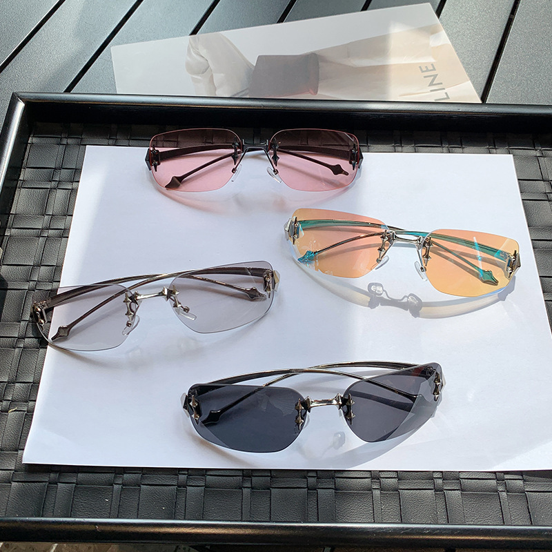 Wholesale 2024 European and American Hot Girls Frameless Cut Edge Sunglasses Fashionable High-End Personalized Metal Glasses Star Sunglasses Women's T