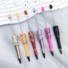 Wholesale DIY Sun Moon Star Beaded Pen Multicolor Sequin Ins Small Star Beaded Ballpoint Pen Handmade Patch Rotating Cute Pen