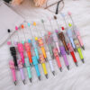Wholesale DIY sequins beaded pen ins colorful resin ballpoint pen student gift pen can wear beads rotating cute pen