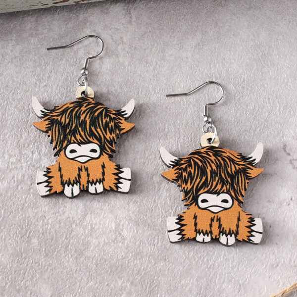 Wholesale Cross-border western style retro HAY GIRL cow head alpine cow personality pendant earrings double-sided wooden earrings gift