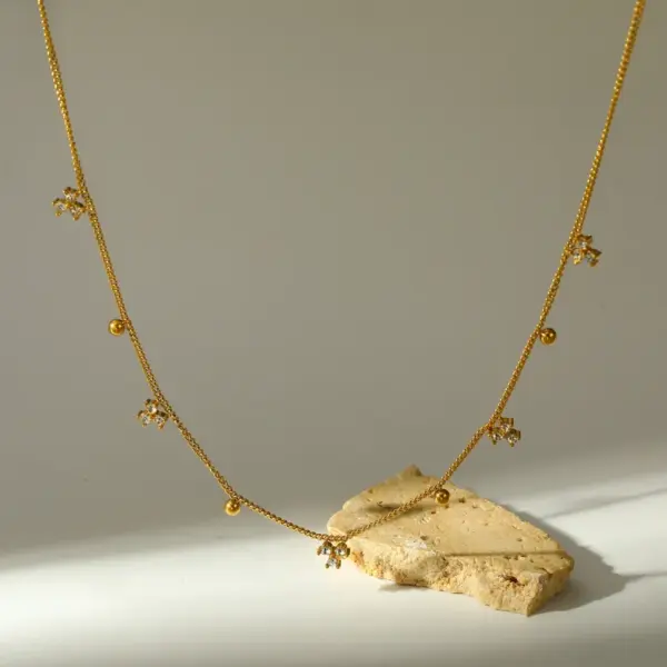 Wholesale Trillion-cut Electroplated Necklace In 18K Gold Plated 304 Stainless Steel With Zircon And 0.03-0.05µm PVD Coating Side Chain