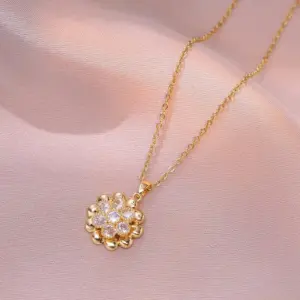 X3191 Gold Rotating Flower Necklace