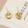 Wholesale Copper Geometric Round Zircon 14K Gold Plated Vintage Style Simple Style Gold Ear Studs