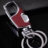 Wholesale High-end metal car keychain, one press, pioneering men's anti-lost waist hanging leather key ring key chain