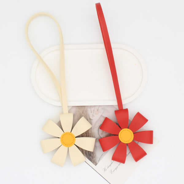 Wholesale Premium PU leather 3D multi-petal flower bag charm keychain ornament