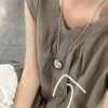 Wholesale South Korea Dongdaemun Rice Beads Titanium Steel Necklace Hollow Love Pendant Grey Fine Pearl Necklace Woolen Chain Women