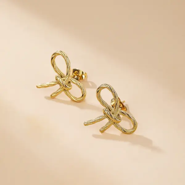 Wholesale 1 Pair Simple Style Classic Style Solid Color Bow Knot Plating 304 Stainless Steel Titanium Steel 18K Gold Plated Ear Studs