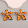 oly-4b09b516077f0228caa7b3a34c5a91c5 Wholesale fashion personality temperament creative oil flower earrings exaerated wave int alloy earrings for women
