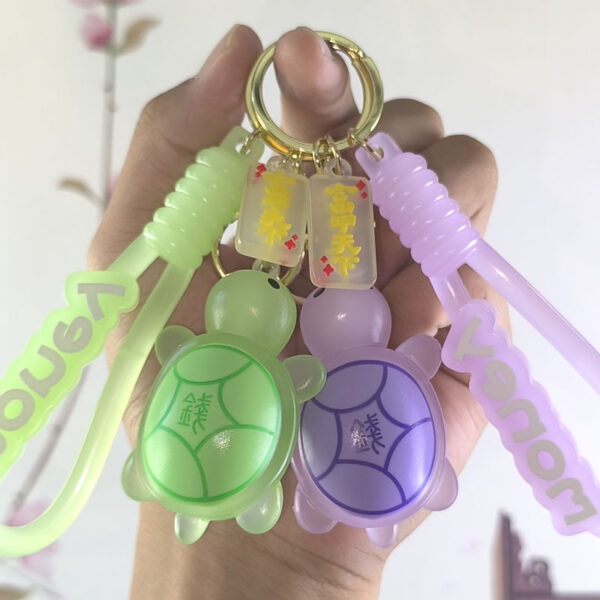 Wholesale Internet Celebrous Luminous Money Little Turtle Keychain Cute School Bag Pendant Key Chain Accessories Doll Machine Gift