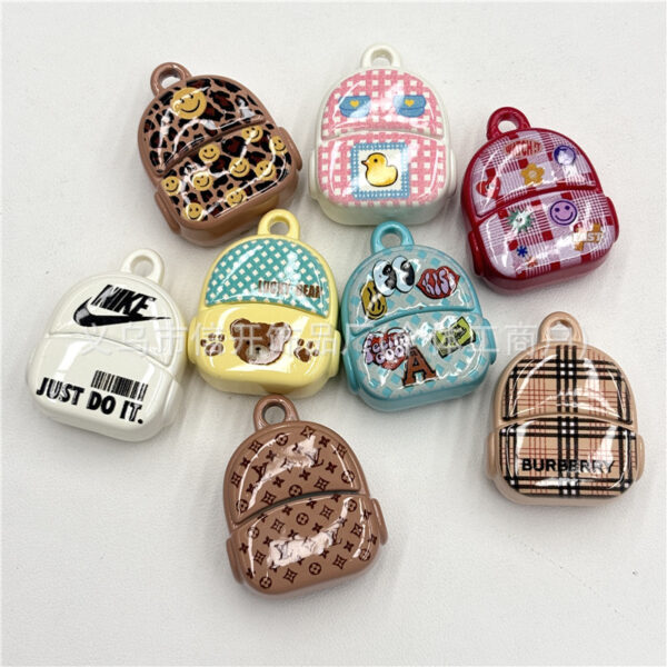 Wholesale Cartoon print beaded backpack with hanging holes