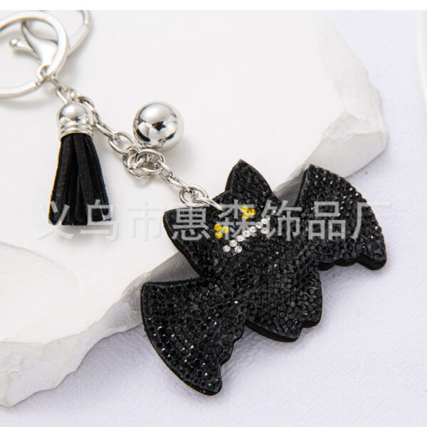 oly-4cbb181c5bae180a787d23b43ee7b8a7 Wholesale Diamond studded bat keychain