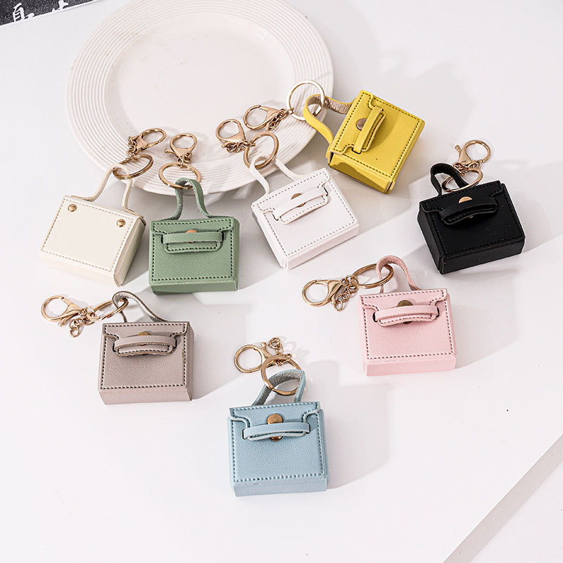 Wholesale Cross-border solid color small square bag creative gift mouth red envelope key chain earphone bag car pu key chain pendant