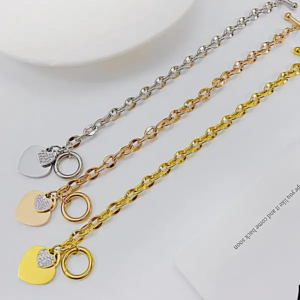 Wholesale Simple Style Heart Shape Titanium Steel Asymmetrical Inlay Artificial Diamond Bracelets
