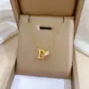 Wholesale PVD Coated Real Gold Plated Circle Letter Butterfly Titanium Steel Simple Style Waterproof Non Tarnish Necklace
