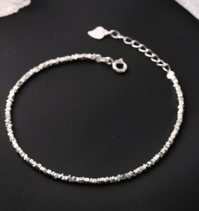 Broken silver bracelet