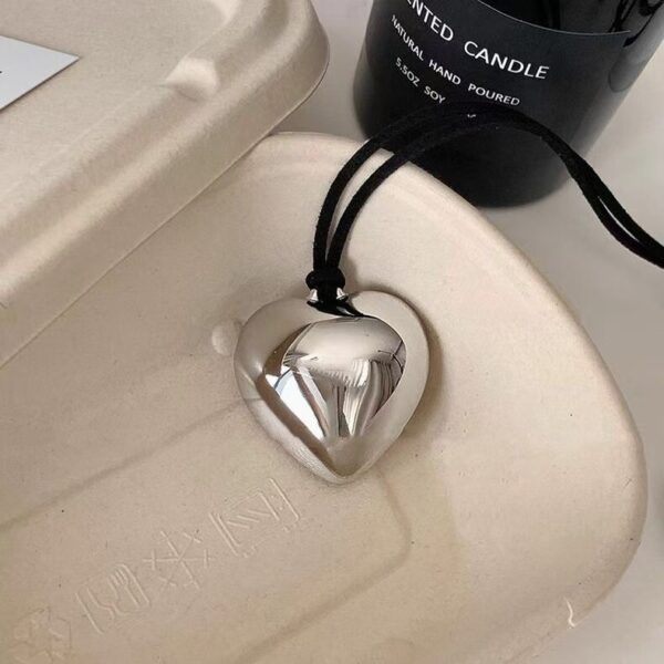 Wholesale South Korea fever love pendant necklace female high sense small long sweater chain explosion autumn and winter accessories