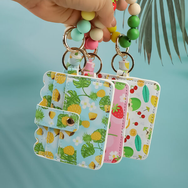 oly-4f93721ab581b06aa60ec5d5664c46a9 Wholesale Fruit Print Pu Card Holder Silicone Beaded Keychain Silicone Bead Bracelet