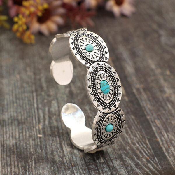 oly-4fd9914a8feed9d899ae29513be4df38 Wholesale Amazon's New Bohemian Retro Style Oval Inlaid Synthetic Turquoise Opening Adjustable Alloy Hand
