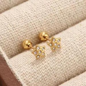 Gold / Average Size / A Pair of Diamond-encrusted Pentagrams