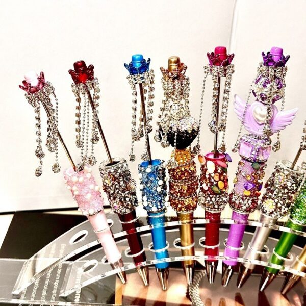 oly-502a35e6be42a96dc77d04a26adb88d8 Wholesale DIY heavy industry beaded pen cross-border super fire hand-set diamond creative pen factory