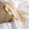 Wholesale PVD Coated Real Gold Plated Heart Shape 304 Stainless Steel Casual Simple Style Classic Style Waterproof Non Tarnish 304 Stainless Steel Bangle