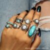 Wholesale Europe and the United States hot cross-border retro inlaid turquoise carved feather ring 8 suit ring jewelry factory direct sales