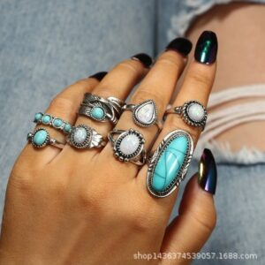 Wholesale Europe and the United States hot cross-border retro inlaid turquoise carved feather ring 8 suit ring jewelry factory direct sales