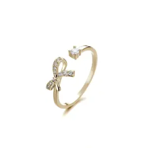 Sweet and Diamond Mounted Bow Gold / Adjustable Opening