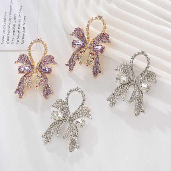Wholesale European and American new fashion high-end sense full diamond bow silver needle earrings women's exquisite elegant colored diamond ear jewelry