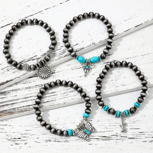 Wholesale Imitation pearl cactus butterfly bull's head flower elastic bracelet, vintage turquoise patchwork CCB bracelet set for women.