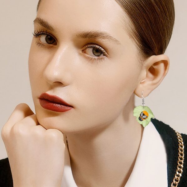 oly-516fe65f5c5de4ec7bc21767d125f8d4 Wholesale Cross-border new buzzing bee earrings Japanese and Korean fashion creative simulation honey transparent bottle earrings