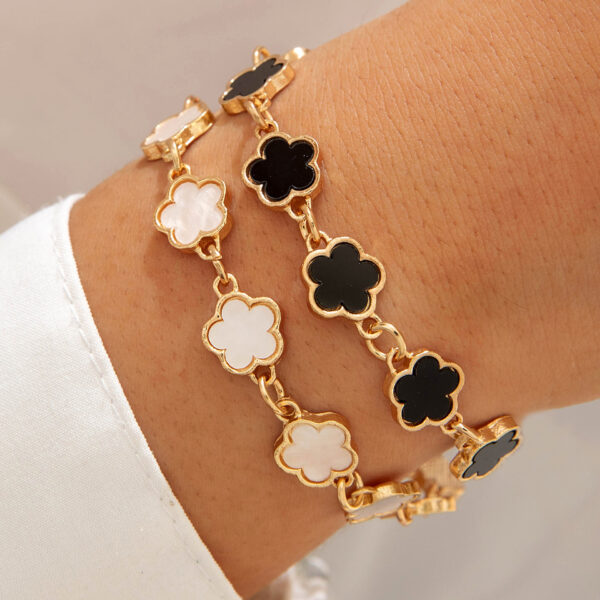 oly-51756c8b5a59e1403ed6080b926c53ab Wholesale Fashion Alloy Clover Bracelet Jewelry Three-Piece Set