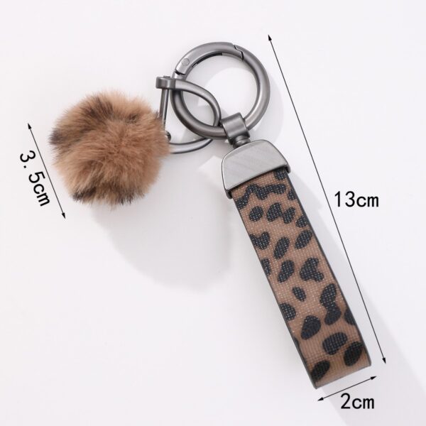 Wholesale Western cowboy style leopard print leather keychain bag charm plush pom-pom water bottle rope