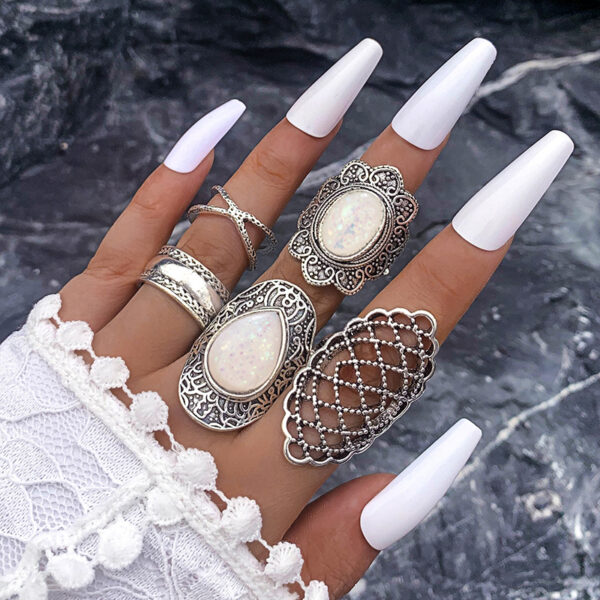 oly-5192e63f84ad986b351222b6c428dee6 Wholesale Black and White Emerald Ring Personalized Retro Oil Dropping Cross Hollow Wide-brimmed Ring 5-piece Set