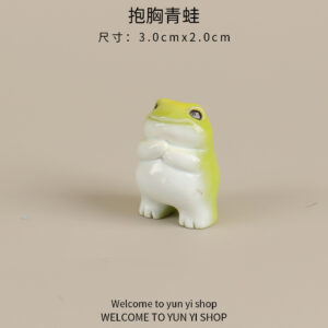 One standing frog with its arms crossed.