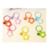 Wholesale Colorful five-pointed star acrylic keychain pendant dopamine earphone case ornaments small fresh couple bag decoration