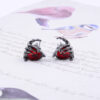 oly-51eb568072f45e1b21eb247d2f188b09 Wholesale Dark punk diamond heart necklace earrings