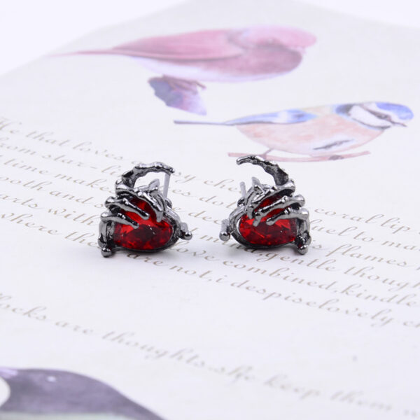 oly-51eb568072f45e1b21eb247d2f188b09 Wholesale Dark punk diamond heart necklace earrings
