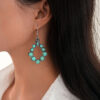 oly-51ec3930a85b03803a5cf575dfcd3ef7 Wholesale European and American New Retro Earrings Bohemian Turquoise Drop-Shaped Cut Out Earrings Earrings Factory Direct Sale